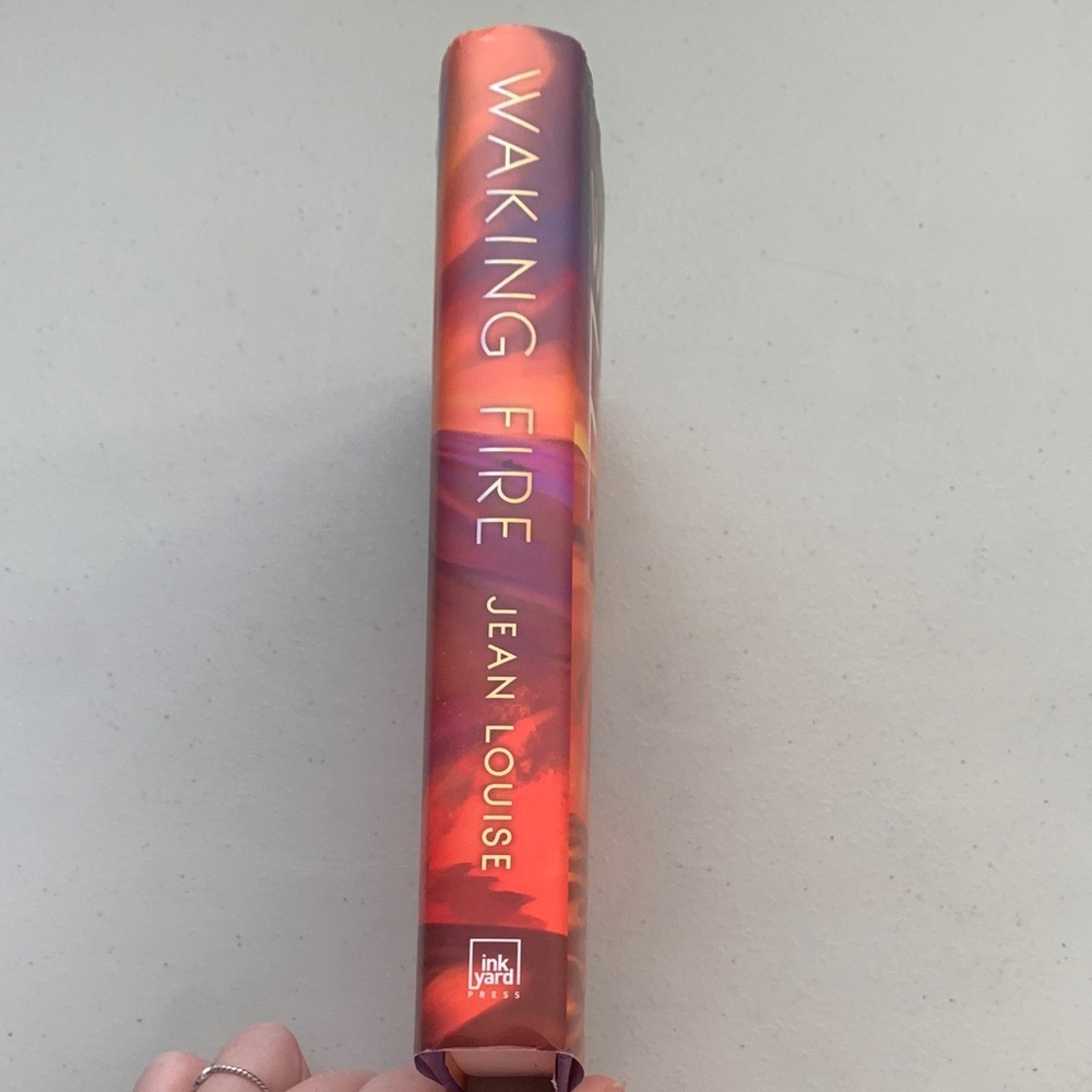 Waking Fire Written by Jean Louise Hardcover Book - Picture 3 of 6